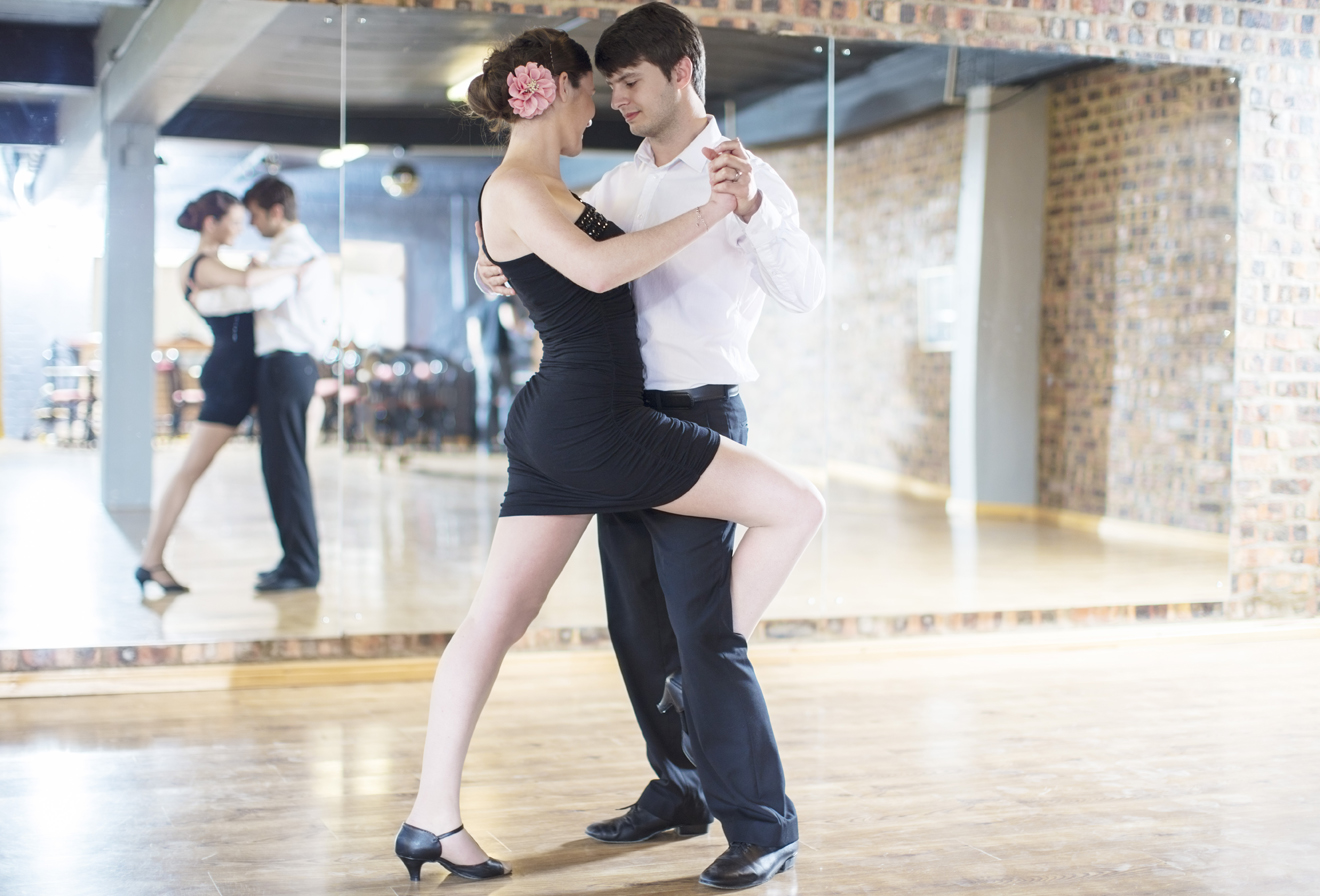 Couple enjoying a romantic dance lesson in Richmond VA